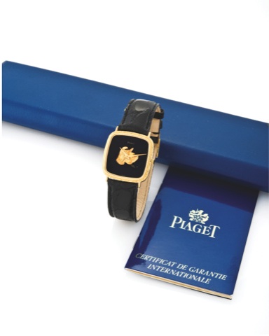 PIAGET REF. 9771.YELLOW GOLD WITH ARTISAN DIAL.Piaget, case No. 450246, Ref. 9771. Made circa 1980..Fine, 18K yellow gold wristwatch with special black onyx.and chased gold signed artisan dial and an 18K yellow.gold Piaget buckle. Accompanied by the origi