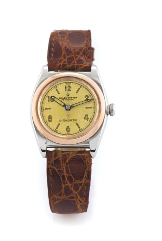 ROLEX BUBBLE BACK REF 3133 STEEL AND PINK GOLD.Rolex, Oyster Perpetual, Chronomètre, case No.300893, Ref. 3133..Made in the 1940s..Fine, tonneau-shaped, center-seconds, self-winding, water-resistant, stainless steel and pink gold wristwatch..To be sold wi