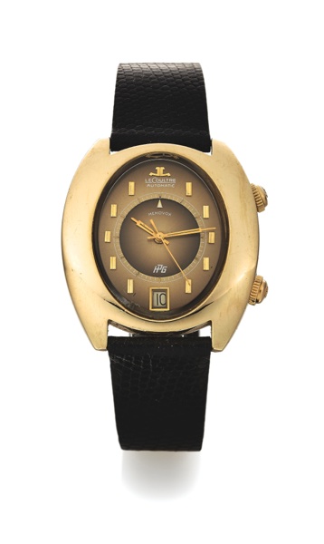 LECOULTRE REF. 3089.MEMOVOX ALARM YELLOW GOLD.LeCoultre, Automatic, No. 2099187, case No. 7026476.Ref. 3089-916. Made in the 1960’s..Fine and unusual, tonneau-shaped, center seconds, selfwinding.water resistant, 14K yellow gold wristwatch with.