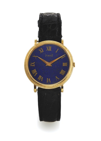 PIAGET REF. 9011 YELLOW GOLD.Piaget, No. 799686, case No. 129993, Ref. 9011. Made in.the 1980s..Fine and elegant, thin, 18K yellow gold midsize.wristwatch with Clous de Paris decoration..To be sold without reserve