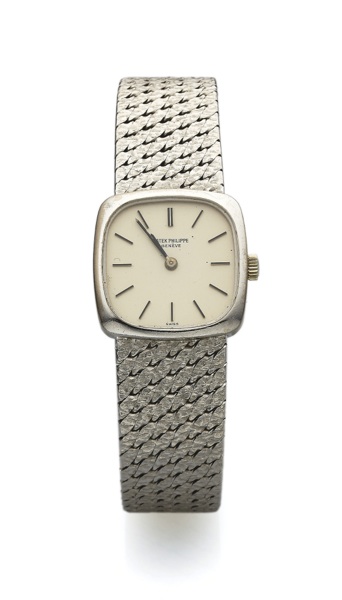 PATEK PHILIPPE REF. 4179 WHITE GOLD.Patek Philippe & Cie, Genève, No. 1260812, case No..2718081, Ref. 4179/1. Made in the early 1990s..Fine, cushion-shaped, 18K white gold wristwatch with.an integral 18K white gold Patek Philippe textured mesh.