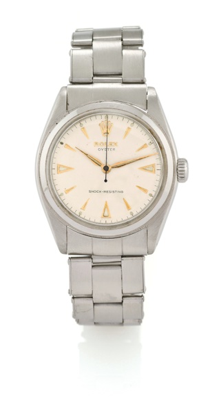 ROLEX, REF. 6022.Rolex, Oyster, Shock-Resisting, case No. 892075, Ref. 6022. Made in 1952..Fine, tonneau-shaped, center seconds, water-resistant, stainless steel wristwatch with a stainless steel riveted Rolex Ref. 7205 bracelet. To be sold wit