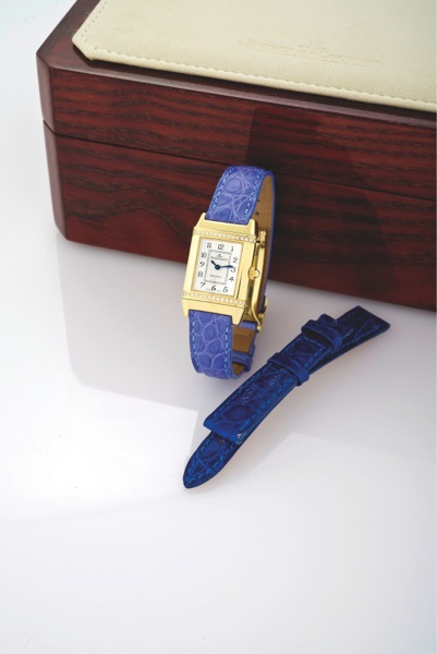 REVERSO JOAILLERIE.Jaeger-LeCoultre, Reverso Joaillerie, No. 2082758, Ref. 265.1.08. Made in the 2000s..Fine and elegant, rectangular, 18K yellow gold and diamond lady’s reversible quartz wristwatch with an 18K yellow gold Jaeger-LeCoultre depl