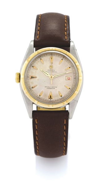 ROLEX REF 6075 STEEL AND YELLOW GOLD LEFT HANDER.Rolex, Oyster Perpetual, Datejust, Officially Certified Chronometer, case No.699043, Ref. 6075. Made circa 1950..Very fine and rare, tonneau-shaped, center seconds, self-winding, water-resistant,
