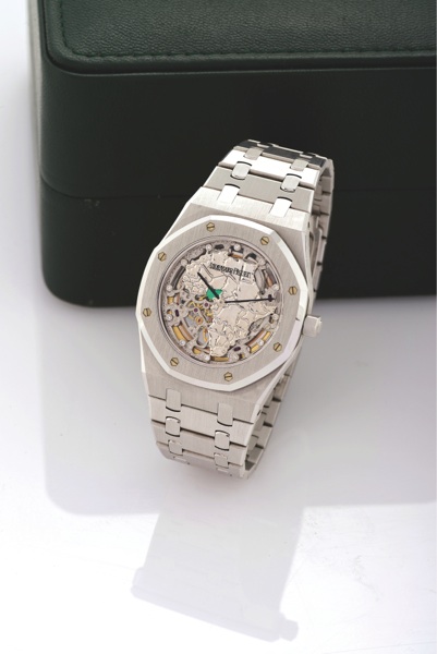 AUDEMARS PIGUET WHITE GOLD ROYAL OAK SPECIAL EDITION FOR NIGERIA WITH SKELETONIZED DIAMOND & EMERALD DIAL.Audemars Piguet, Genève, ‘Royal Oak Nigeria’, Automatic, movement No. 399612, case No. E9904, Ref. 14811BC. Made in 30 examples in 1998 an