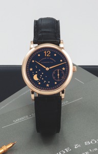 A. Lange & Söhne 1815 - Emil Lange - Moon Phase. A. Lange & Söhne, Glashütte i. SA, “1815 - Emil Lange - Moon. Phase”, No. 1149250, movement No. 14112, case No. 124149. Ref. 231.031. Made in a limited edition of 250 examples in. 2000. Sold on August 15th,
