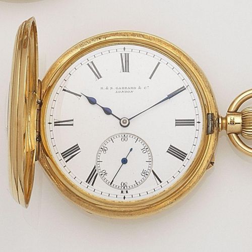 R & S. Garrard & Co. An 18ct gold keyless wind half hunter pocket watch