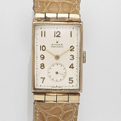 Rolex. A 9ct gold manual wind wristwatch