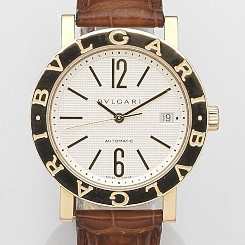 Bulgari. An 18ct gold automatic calendar wristwatch
