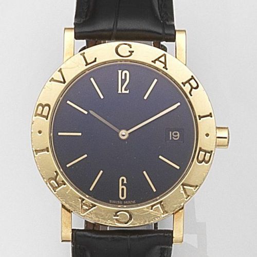 Bulgari. An 18ct gold quartz calendar wristwatch