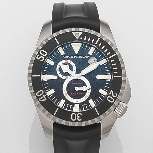 Girard-Perregaux. A stainless steel automatic calendar wristwatch