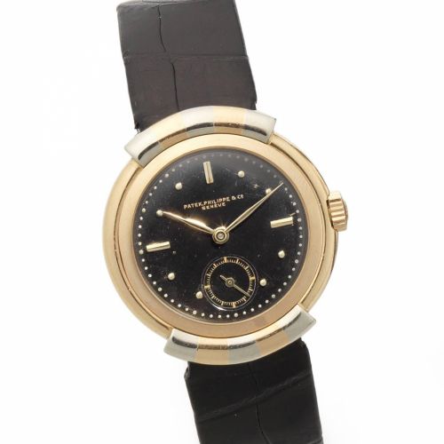 Patek Philippe. A fine and very rare 18ct rose and white gold manual wind wristwatch with hooded lugs and black dial and Patek Philippe Extract from Archives
