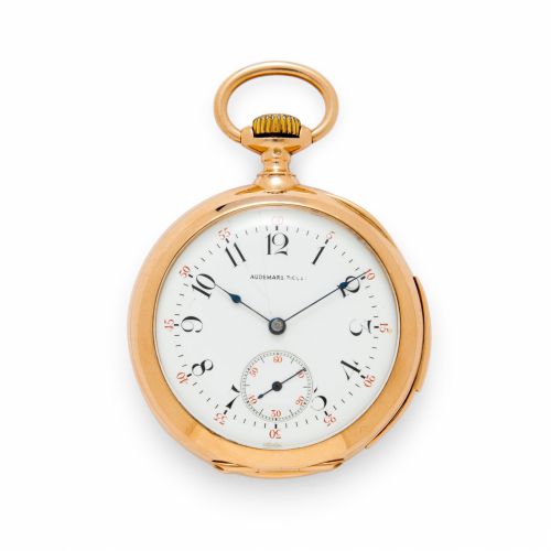 Swiss. An 18K rose gold open face minute repeating watch