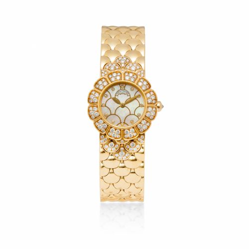 Patek Philippe. A fine 18K gold and diamond lady's bracelet watch