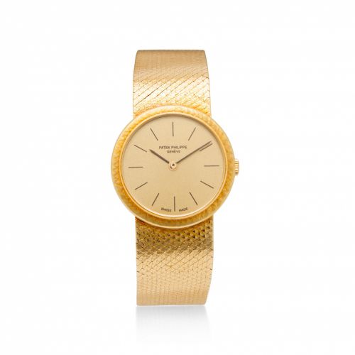 Patek Philippe. An 18K gold lady's bracelet watch