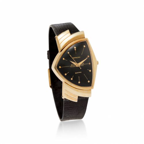 Hamilton. A 14K gold electric wristwatch