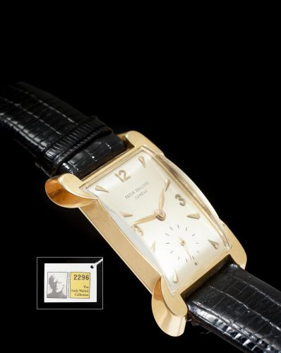 Patek Philippe. A fine and rare 18K gold shaped rectangular wristwatch