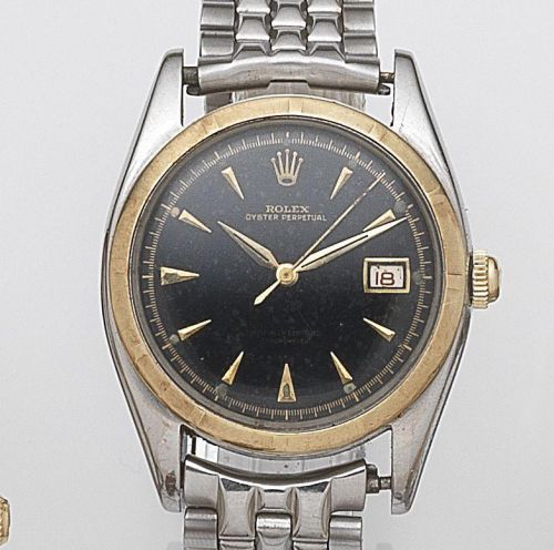 Rolex. A stainless steel and gold automatic bubbleback bracelet watch