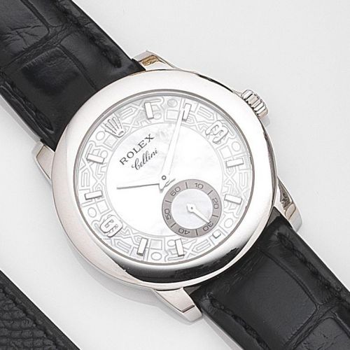 Rolex. A platinum manual wind wristwatch with mother of pearl dial