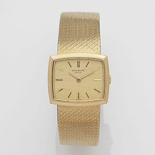 Patek Philippe. A lady's 18ct gold manual wind bracelet watch