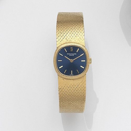 Patek Philippe. A lady's 18ct gold manual wind bracelet watch