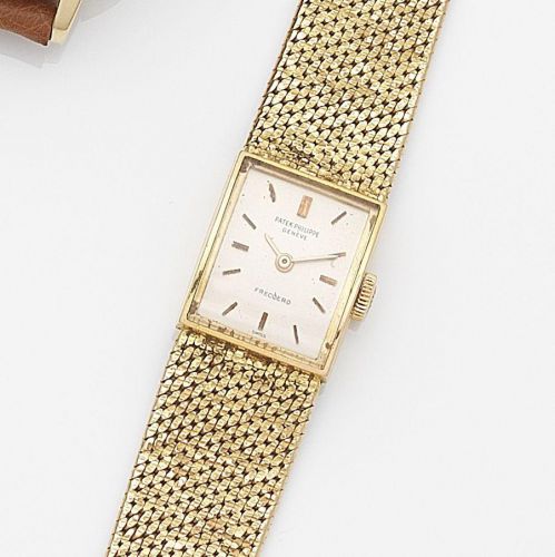 Patek Philippe. A lady's 18ct gold manual wind bracelet watch