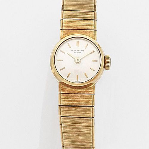 Patek Philippe. A lady's 18ct gold manual wind bracelet watch