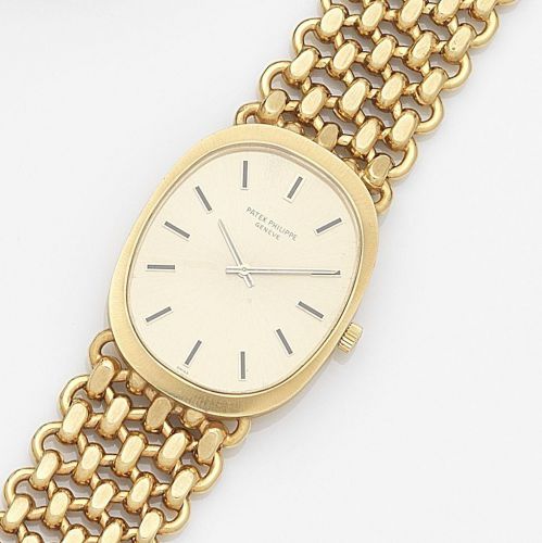 Patek Philippe. An 18ct gold manual wind bracelet watch