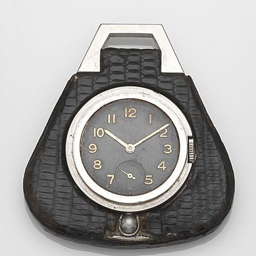 Rolex. A stainless steel and leather cased keyless wind travel watch