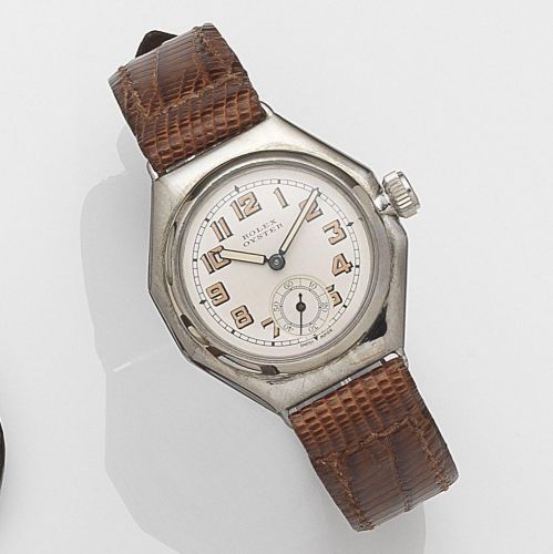 Rolex. A stainless steel manual wind wristwatch