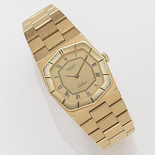Rolex. A lady's 18ct gold manual wind bracelet watch