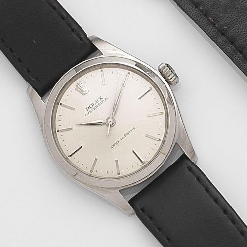 Rolex. A stainless steel manual wind wristwatch