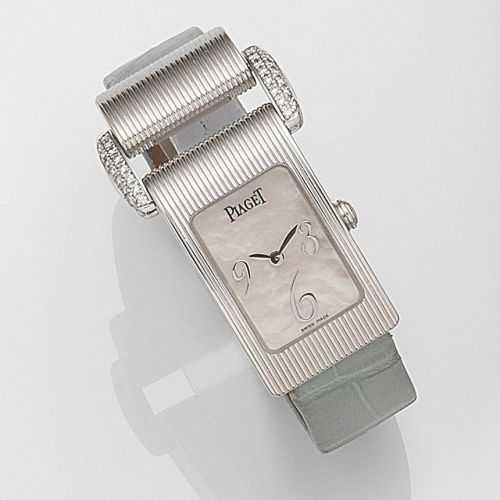 Piaget. A lady's 18ct white gold and diamond set quartz wristwatch