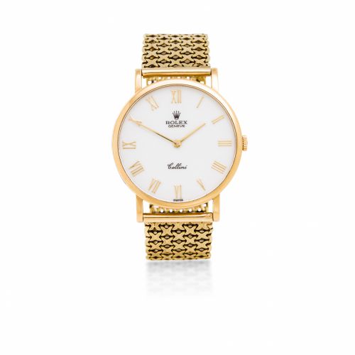 Rolex. An 18K gold wristwatch