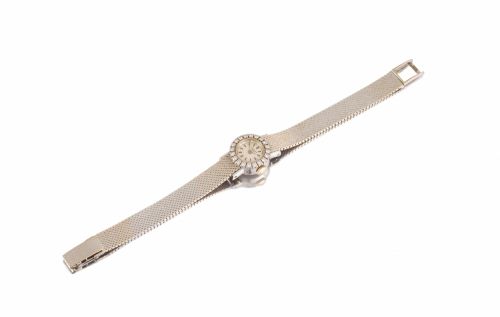 Patek Philippe. A lady's 18K white gold bracelet watch with diamond-set bezel