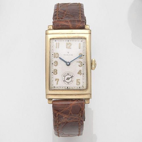 Rolex. A 9ct gold manual wind wristwatch