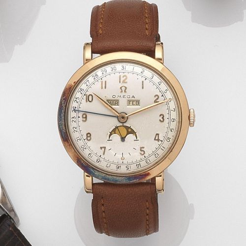 Omega. An 18ct gold manual wind calendar wristwatch with moon phase
