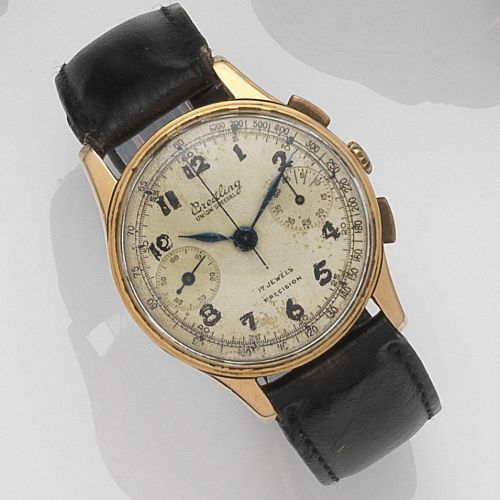 Swiss. An 18ct gold manual wind chronograph wristwatch