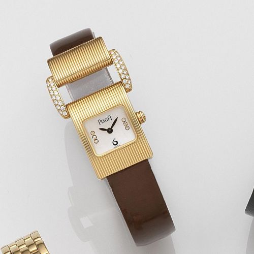 Piaget. A lady's 18ct gold and diamond set quartz wristwatch