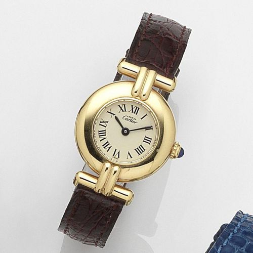 Cartier. A lady's gold plated quartz wristwatch