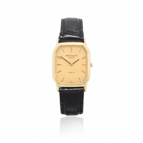 Patek Philippe. An 18K gold wristwatch, retailed by Gübelin