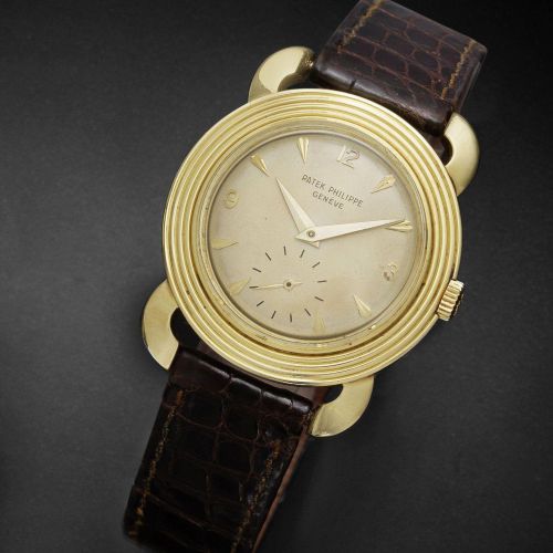 Patek Philippe. An unusual and rare 18ct gold manual wind wristwatch