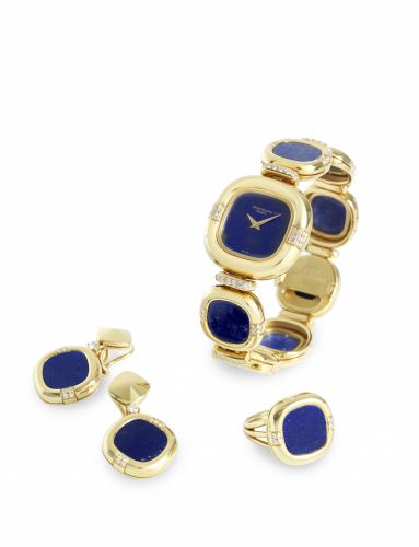 Patek Philippe. A lady's fine and rare 18ct gold, lapis lazuli and diamond set manual wind bracelet watch with matching earrings and ring