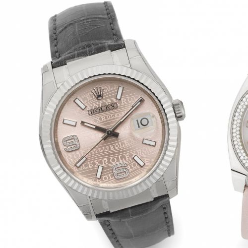 Rolex. A fine 18ct white gold automatic calendar wristwatch