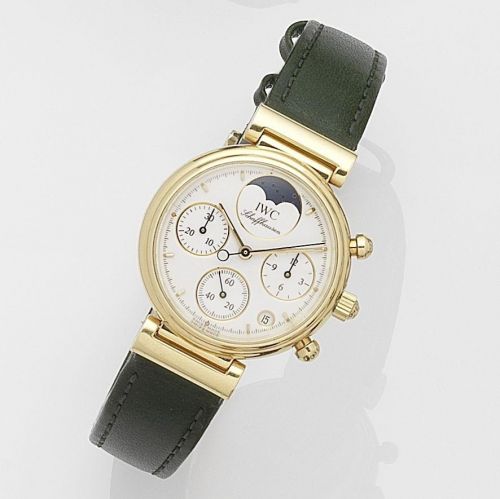 IWC. A lady's 18k gold quartz calendar chronograph wristwatch with moon phase