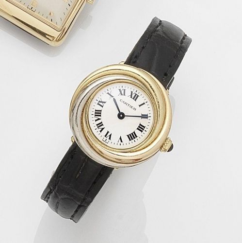 Cartier. A lady's 18k three colour gold quartz wristwatch