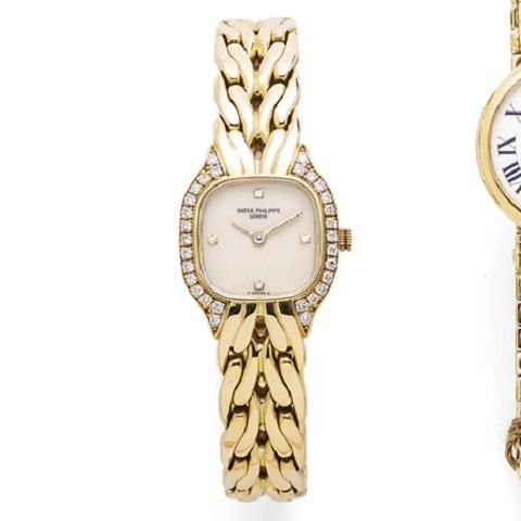 Patek Philippe. A lady's 18K gold and diamond set quartz bracelet watch