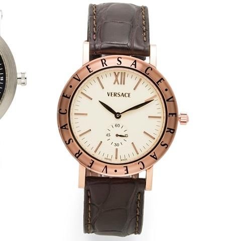 Versace. An 18K gold manual wind wristwatch with box and papers