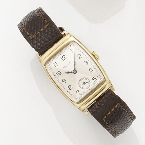 Rolex. A lady's 9K gold manual wind wristwatch