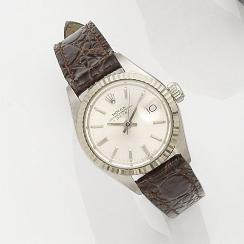 Rolex. A lady's stainless steel automatic calendar wristwatch